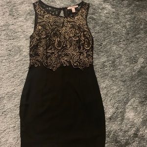 Black and gold short dress.